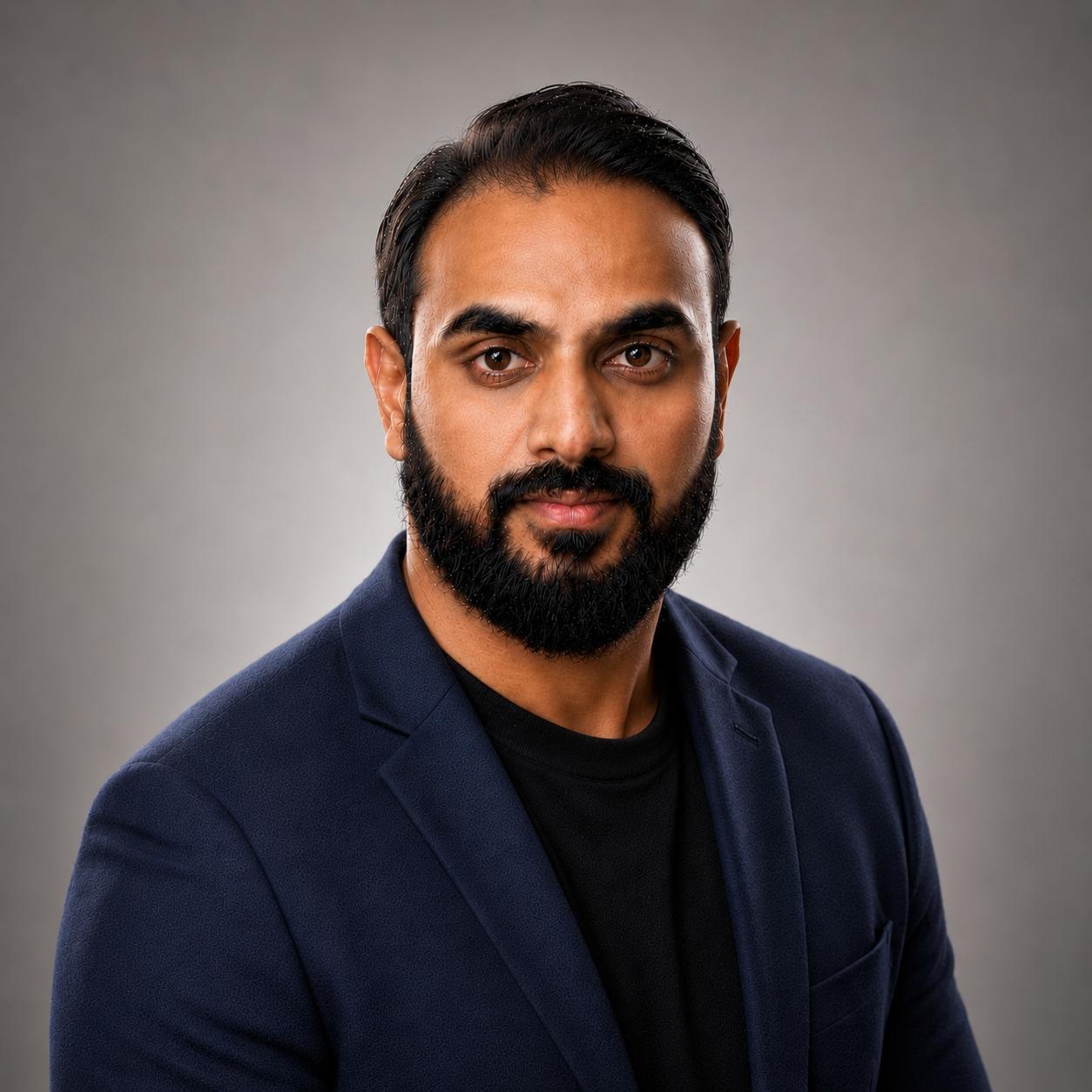 Professional headshot of Arun Samayam